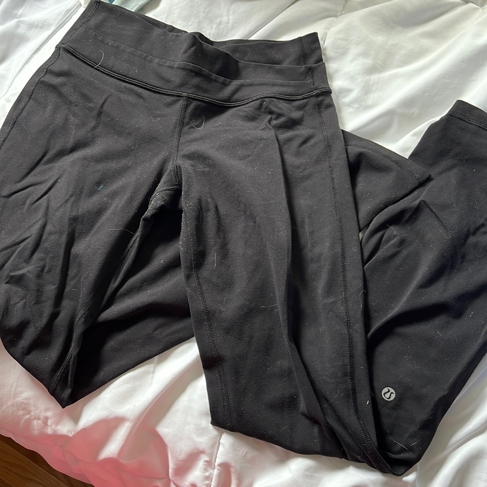 Lululemon black cross over flare yoga pant size 4 reg